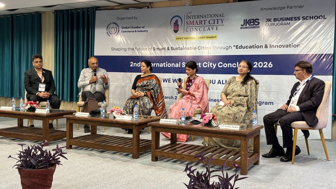 At the 2nd International Smart City Conclave 2026, hosted at JK Business School, Gurugram (JKBS), thought leaders, policymakers, and industry experts came together to discuss one of the most critical themes shaping modern India: Smart Cities and Sustainable Urban Development. Session 1, titled “Smart Cities, Sustainable Futures: Assessing India’s Urban Transformation Journey”, set the tone for the conclave by focusing on how innovation, governance, and sustainability are driving urban transformation across the country. Held on 27th March 2026, the session brought together a diverse panel of experts who shared practical insights, industry perspectives, and forward-looking ideas. Distinguished Speakers The session featured an accomplished panel of leaders from industry and academia: Dr. Sushil Aggarwal, Chairman, Avro Recycling Ltd Mr. Kalpesh Amin, Burlington English Dr. Lata Rani, Associate Professor, DSEU Ms. Ruma Batheja, Partner, Knowledgetics Research Mr. Rajarshi Banerjee, Chief Business Officer – Banking, LeadsConnect Mr. Sushil Dubey, CEO, Urja Global Limited Dr. Renu Singh, Sr. Trainer, Fintech, ISDC Global Dr. Sukhamaya Swain, Professor, JK Business School, Gurugram Each speaker brought a unique perspective, ranging from policy frameworks and financial ecosystems to sustainability practices and digital transformation in urban development. Key Discussion Highlights The session explored how India’s cities are evolving through: 1. Innovation-led Urban Development Speakers emphasized the role of technology, digital infrastructure, and smart governance systems in transforming urban spaces into efficient, citizen-centric ecosystems. 2. Sustainability as a Core Strategy Sustainable practices are no longer optional. The discussion highlighted how environmental responsibility is becoming central to urban planning, energy use, and infrastructure development. 3. Governance and Policy Integration Strong collaboration between government bodies, private sector players, and academic institutions is essential to drive scalable and impactful urban solutions. 4. Financial and Digital Ecosystems The role of fintech, data-driven decision-making, and investment frameworks was highlighted as a key enabler for smart city initiatives. Impactful Conversations and Insights From keynote perspectives to engaging panel discussions, the session provided a comprehensive view of how India’s urban future is being shaped by innovation, leadership, and sustainability-driven thinking. It also reinforced the importance of platforms like the International Smart City Conclave in fostering dialogue between academia and industry, aligning perfectly with JK Business School, Gurugram’s commitment to industry-integrated learning. The JKBS Edge At JK Business School, Gurugram, such initiatives reflect the institution’s focus on preparing students for real-world challenges. Through conclaves, industry interactions, and experiential learning, JKBS continues to build future-ready leaders equipped to contribute to evolving sectors like smart infrastructure, sustainability, and digital transformation. Backed by the 140+ years legacy of the JK Organisation, JKBS stands as The perfect Eco-Centre of Success, bridging academic excellence with industry relevance. Conclusion Session 1 of the conclave successfully laid the foundation for deeper discussions by addressing critical questions around urban transformation. It highlighted a clear message: The future of cities lies at the intersection of innovation, sustainability, and collaborative leadership. At the 2nd International Smart City Conclave 2026, hosted at JK Business School, Gurugram (JKBS), thought leaders, policymakers, and industry experts came together to discuss one of the most critical themes shaping modern India: Smart Cities and Sustainable Urban Development. Session 1, titled “Smart Cities, Sustainable Futures: Assessing India’s Urban Transformation Journey”, set the tone for the conclave by focusing on how innovation, governance, and sustainability are driving urban transformation across the country. Held on 27th March 2026, the session brought together a diverse panel of experts who shared practical insights, industry perspectives, and forward-looking ideas. Distinguished Speakers The session featured an accomplished panel of leaders from industry and academia: Dr. Sushil Aggarwal, Chairman, Avro Recycling Ltd Mr. Kalpesh Amin, Burlington English Dr. Lata Rani, Associate Professor, DSEU Ms. Ruma Batheja, Partner, Knowledgetics Research Mr. Rajarshi Banerjee, Chief Business Officer – Banking, LeadsConnect Mr. Sushil Dubey, CEO, Urja Global Limited Dr. Renu Singh, Sr. Trainer, Fintech, ISDC Global Dr. Sukhamaya Swain, Professor, JK Business School, Gurugram Each speaker brought a unique perspective, ranging from policy frameworks and financial ecosystems to sustainability practices and digital transformation in urban development. Key Discussion Highlights The session explored how India’s cities are evolving through: 1. Innovation-led Urban Development Speakers emphasized the role of technology, digital infrastructure, and smart governance systems in transforming urban spaces into efficient, citizen-centric ecosystems. 2. Sustainability as a Core Strategy Sustainable practices are no longer optional. The discussion highlighted how environmental responsibility is becoming central to urban planning, energy use, and infrastructure development. 3. Governance and Policy Integration Strong collaboration between government bodies, private sector players, and academic institutions is essential to drive scalable and impactful urban solutions. 4. Financial and Digital Ecosystems The role of fintech, data-driven decision-making, and investment frameworks was highlighted as a key enabler for smart city initiatives. Impactful Conversations and Insights From keynote perspectives to engaging panel discussions, the session provided a comprehensive view of how India’s urban future is being shaped by innovation, leadership, and sustainability-driven thinking. It also reinforced the importance of platforms like the International Smart City Conclave in fostering dialogue between academia and industry, aligning perfectly with JK Business School, Gurugram’s commitment to industry-integrated learning. The JKBS Edge At JK Business School, Gurugram, such initiatives reflect the institution’s focus on preparing students for real-world challenges. Through conclaves, industry interactions, and experiential learning, JKBS continues to build future-ready leaders equipped to contribute to evolving sectors like smart infrastructure, sustainability, and digital transformation. Backed by the 140+ years legacy of the JK Organisation, JKBS stands as The perfect Eco-Centre of Success, bridging academic excellence with industry relevance. Conclusion Session 1 of the conclave successfully laid the foundation for deeper discussions by addressing critical questions around urban transformation. It highlighted a clear message: The future of cities lies at the intersection of innovation, sustainability, and collaborative leadership.